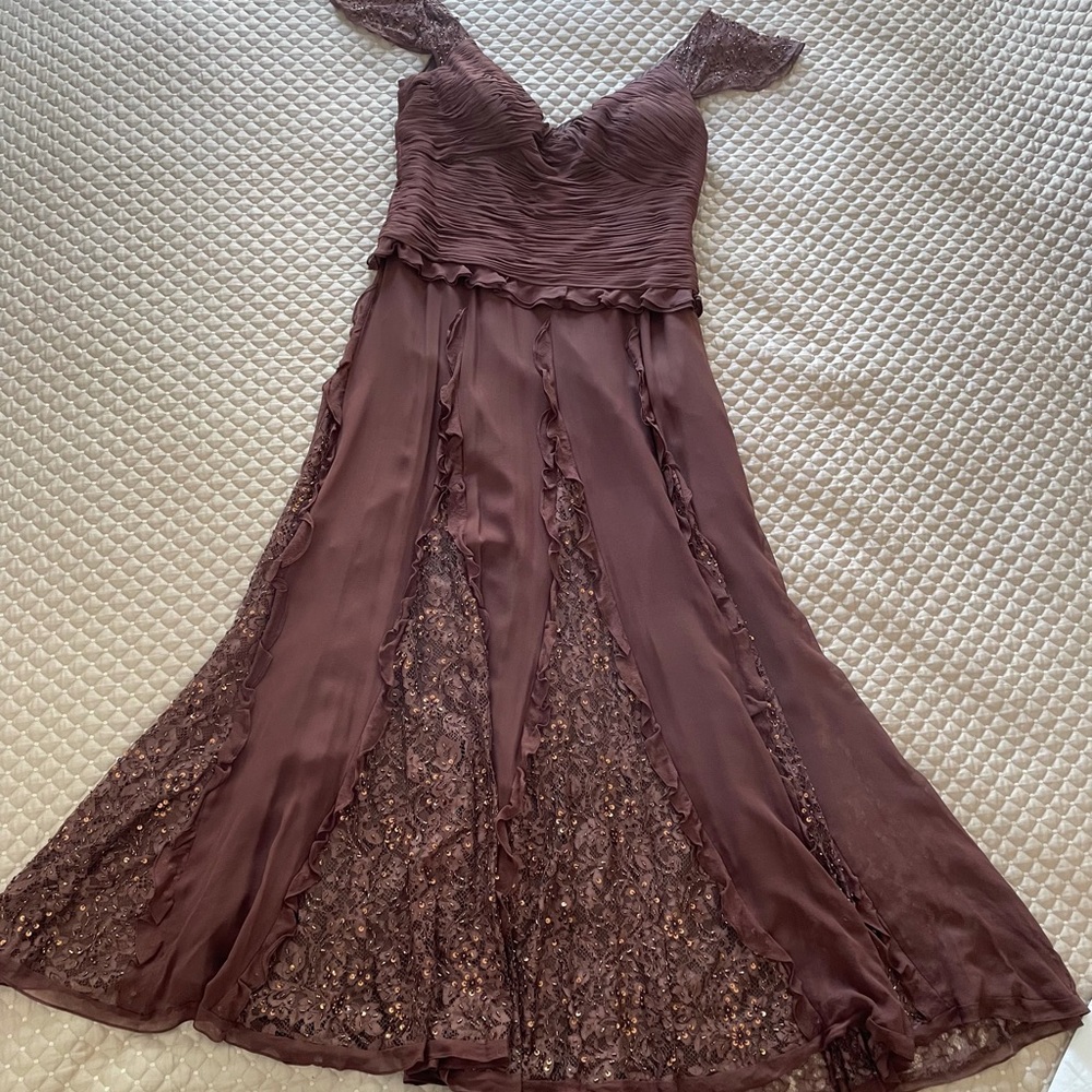 Stunning beaded and sequenced gown. Size 18.